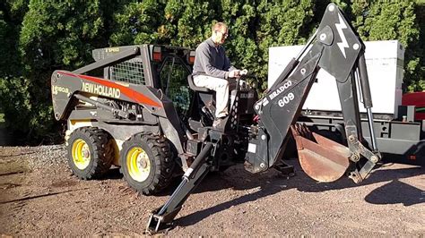 bradco backhoe skid steer adapters|bradco 609 backhoe attachment.